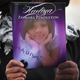 Minister Elnor Brown holds up the funeral program for 15-year-old Hadiya Pendleton outside Chicago’s Greater Harvest M.B. Church during funeral services for the teen Feb. 9, 2013.
Scott Olson/Getty Images
